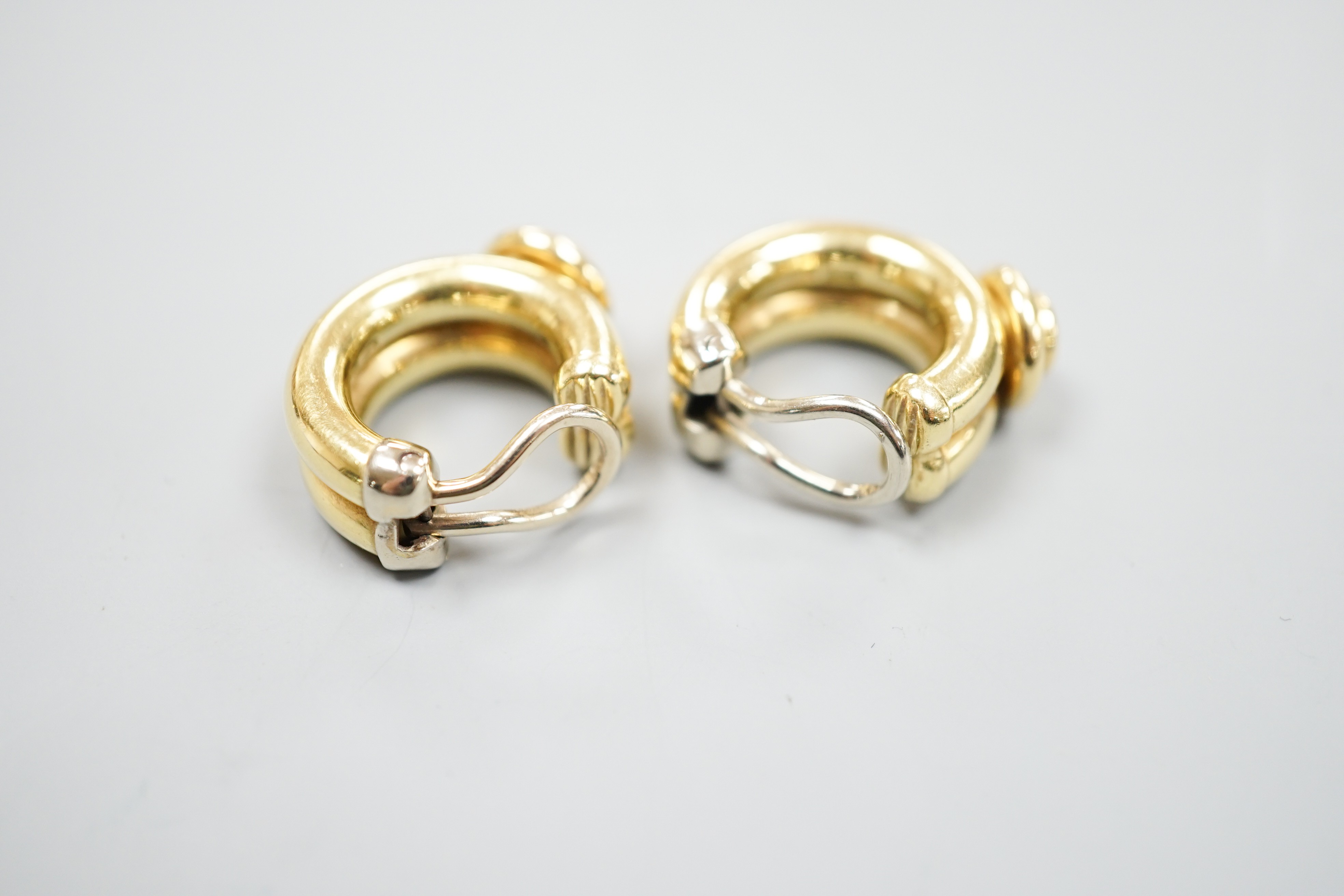 A pair of 20th century Italian 750 yellow metal and diamond set hoop ear clips, 22mm
